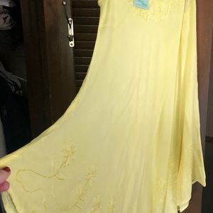 Yellow embroidered shift dress.